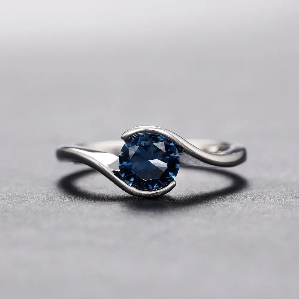 Treasure's Solitaire Blue Ring
